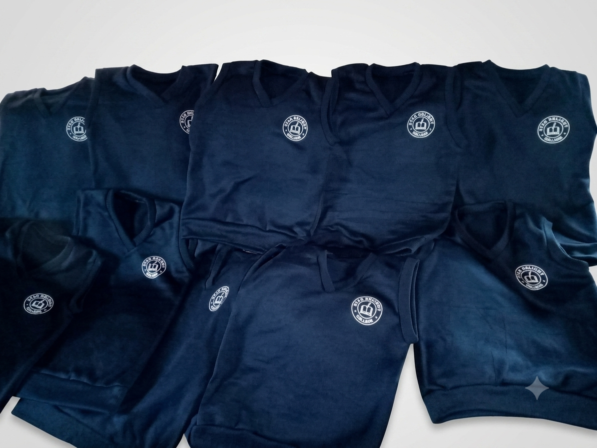 Navy school sweaters with embroidered Star Bright College crests